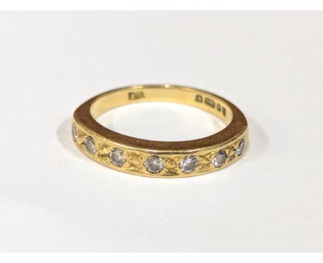A diamond and 18ct gold ring. Stamped 750.&nbsp; 3gms