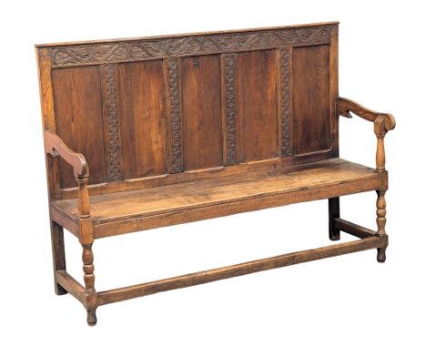 A large Late 18th Century George III oak settle bench with carved panel back and turned legs. Circa 1780. 156x50.5x114cm(6) 