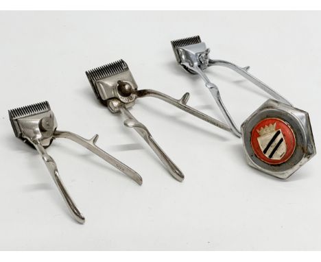 3 vintage shavers and a car mascot. 