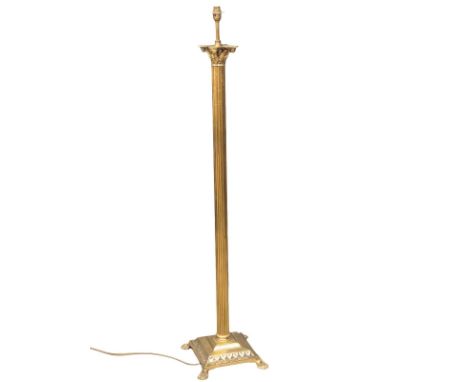 A vintage brass standard lamp with Corinthian style column. 140cm(2) 