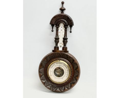 A Late 19th Century Victorian barometer. 42cm 