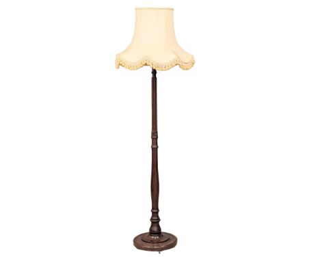 A vintage mahogany standard lamp. 186cm(2) 