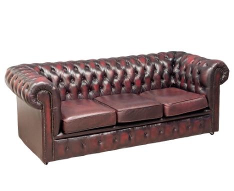 A leather ox-blood three seater club sofa. 193cm 