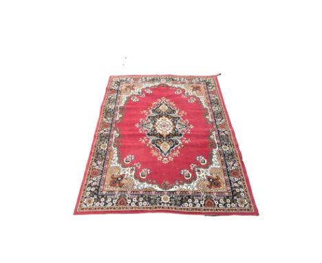 A vintage Middle Eastern style rug. 244x180cm 