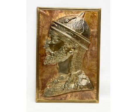 A vintage repousse copper and brass Saladin wall plaque. 30x46cm. 