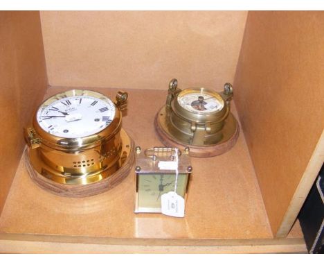 A ship style clock, barometer etc.