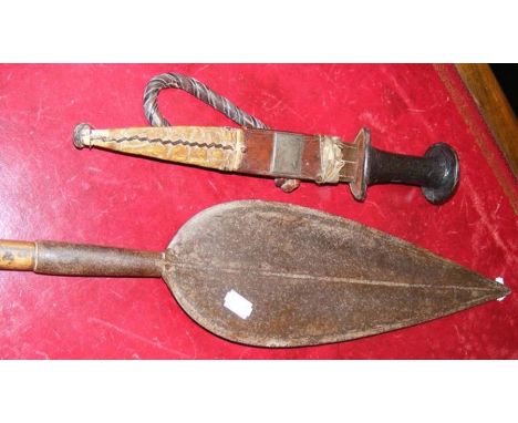 An antique metal and wooden African spear - 128cm long, together with an African dagger with leather scabbard - the leather s