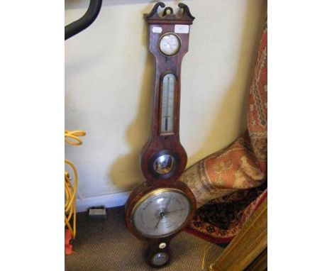 A 19th century wall barometer and thermometer 