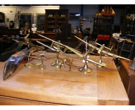 A collection of brass model planes together with 'Brigade of Gurkhas' plaque and Middle Eastern Kukri  CONDITION REPORT To ou