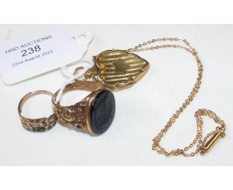 A gold ring, locket and chain etc.