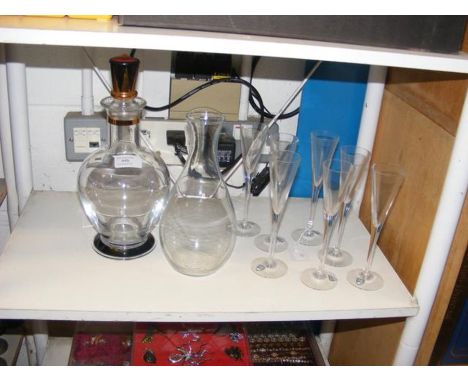 A Nobel decanter commemorating the Nobel Prize, together with wine flutes by Orrefors