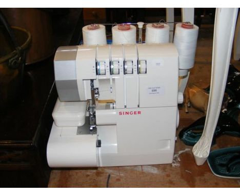 A Singer Overlock 14SH754 sewing machine  CONDITION REPORT Functionality untested, but vendor ensures us item is working.