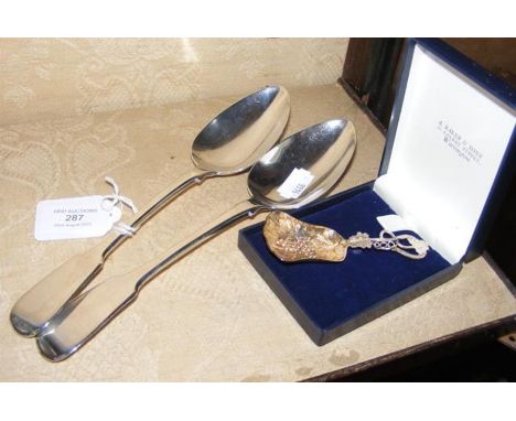 A pair of silver serving spoons together with caddy spoon CONDITION REPORT Serving spoons length 22.5cm, weight 163g.Cassy sp