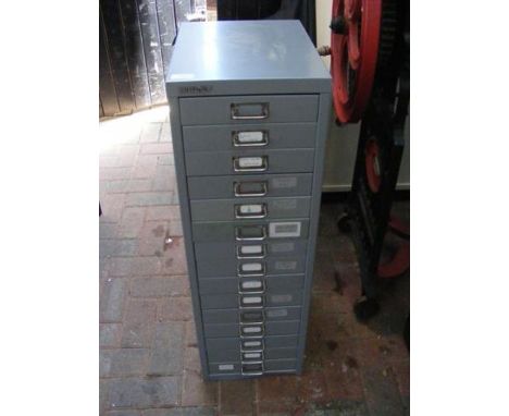 A Bisley metal cabinet with fifteen drawers - some with tools