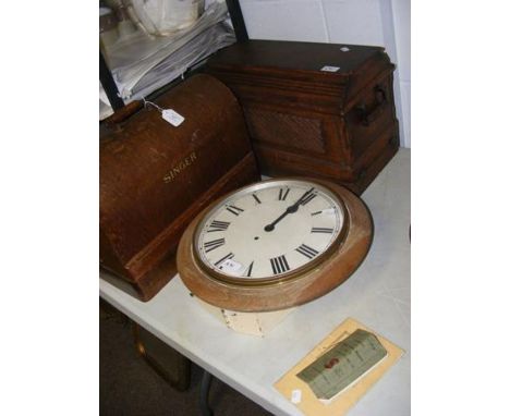Two old sewing machines and a wall clock 