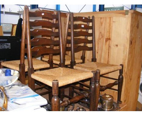 Four ladder back chairs with reeded seats 