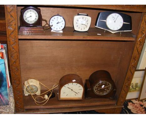 An assortment of vintage clocks - Metamec, Smiths and others