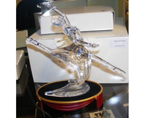 A Swarovski crystal 'Magic of Dance' figurine on plinth with original box