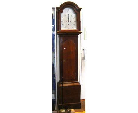 A 19th century oak cased eight day Grandfather clock by Richard Clark of Newport, Isle of Wight, having silver dial with sepa