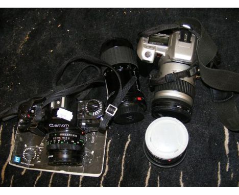 Vintage cameras and lenses including Canon A1 and Minolta Dynax 505Si