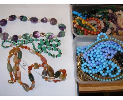 A jade necklace with matching bracelet, both having 9ct clasps, together with a selection of costume jewellery, including nec