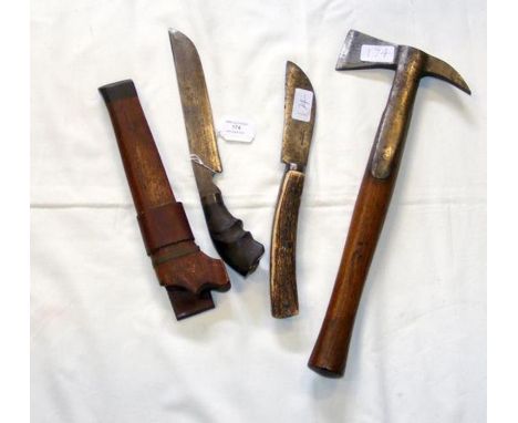 A Middle Eastern dagger together with Underwood of London knife and an axe