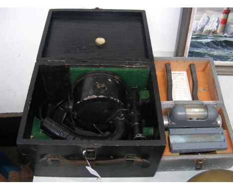 A vintage ship's signalling lamp in carrying case, together with a military gunnery clinometer 