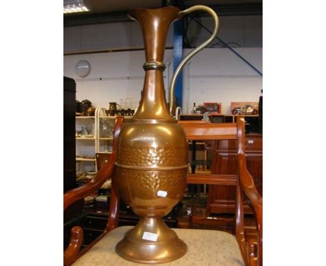 A vintage Indian brass picture with hammered detail 