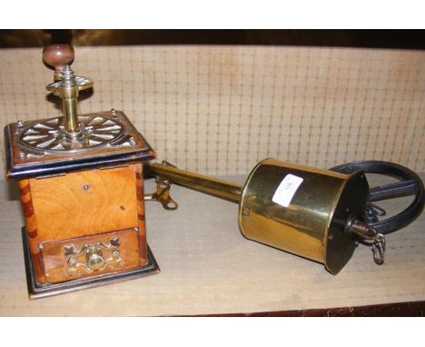 An antique brass bound coffee grinder, together with a spit roast 