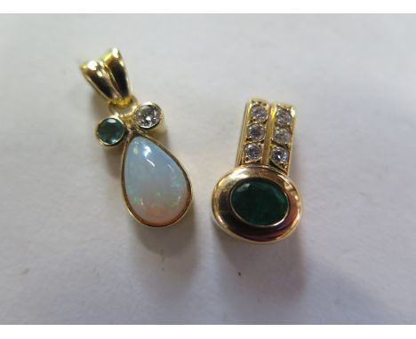 Two unmarked gilt metal pendants set with diamonds emerald and opal, tallest 20mm total approx 4.6 grams, both good condition