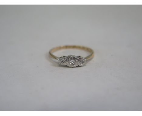 A two stone diamond illusion set ring with 9ct gold band, ring size N/O, approximately 1.9g 