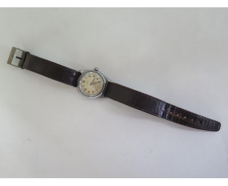 A Solar Oyster style gents wristwatch- manual wind - 30mm wide including button - running - wear consistent with age 