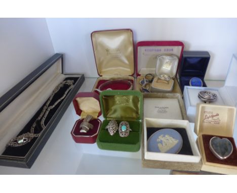 A collection of silver jewellery, rings, a bangle, necklace, Wedgwood brooch and ring, see images for details, silver content
