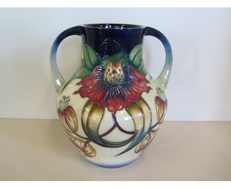 A 1998 Moorcroft Anna Lily pattern twin handled vase, approx 26cm high, some light wear, otherwise in good condition 