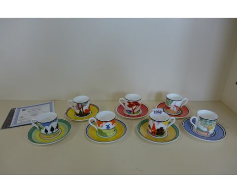 Seven Wedgwood Clarice Cliff design coffee cans and saucers, with certificates, all good condition 