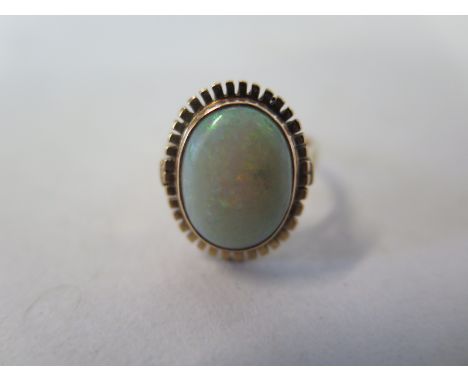 A 14 ct yellow gold and opal ring, size L, approx 4 grams, in good condition 