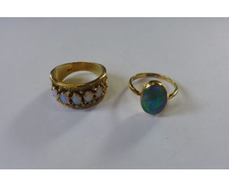 An 18ct gold opal ring, size L approximately 1g together with a five stone opaline ring stamped 14k, approximately 6.2g 