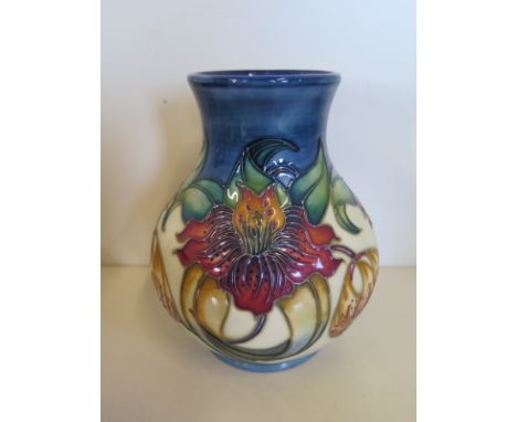 A 1998 Moorcroft pattern vase approx 16cm High - with original box, some light wear otherwise in good condition 
