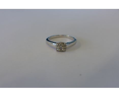 A silver and diamond set ring 0.25ct, with report, ring size M, approx 3.5 grams - good condition 