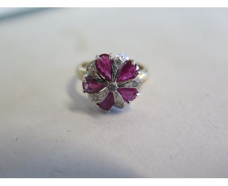 A 9ct gold ruby and diamond ring, 15mm diameter, ring size O, approx 4 grams, good condition 