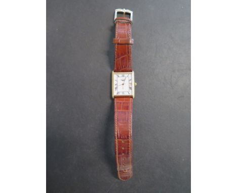 A gents Rotary 9ct gold quartz wristwatch on a faux crocodile strap, generally clean condition - running 