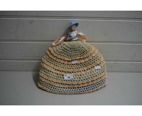 TEA COSY WITH CERAMIC DOLL