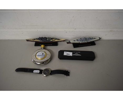 TWO MODELS OF BATTLESHIPS AND A FLASK MARKED 'QUEEN MARY'