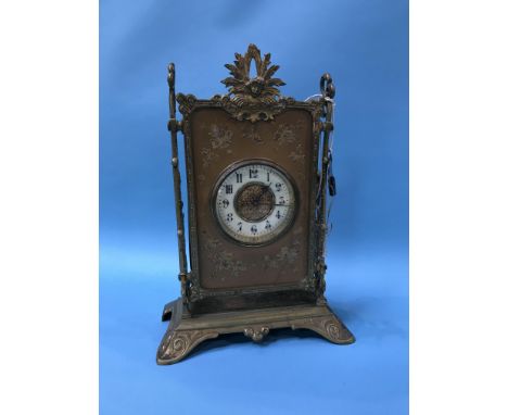 A Continental decorative brass mantle clock
