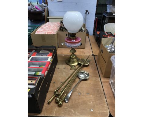 Fire irons and an oil lamp