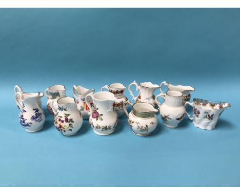 Twelve miniature Royal Worcester cream jugs