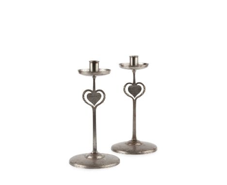 Arts and CraftsA pair of candlestickspewter28cm high. Provenance:The collection of Paul Whitfield (1942–2018)Paul Whitfield’s