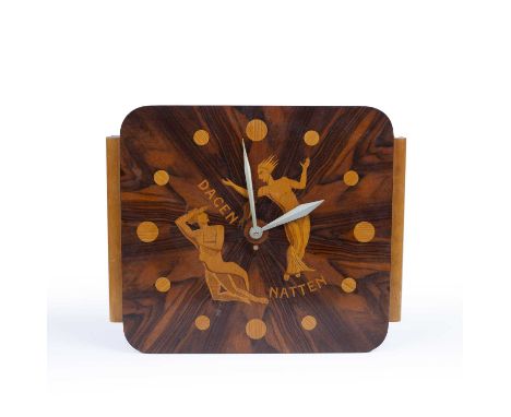 Attributed to Mjölby Intarsia Wall Clock, circa 1930inlaid wood36 x 43cm. Provenance:The collection of Terence Conran (1931-2