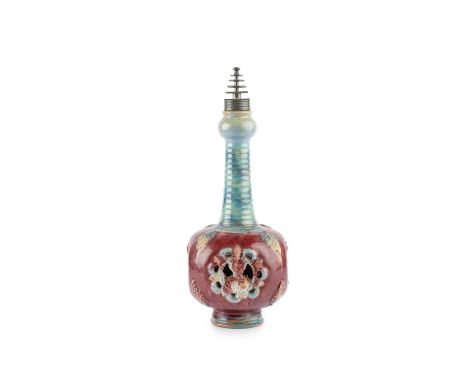 Art NouveauArt Pottery vasethe body with four pierced and moulded decorative panels, the slender turned neck with a turquoise