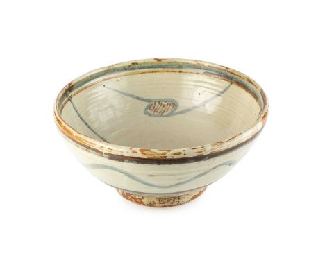 Michael Cardew (1901-1983) at Wenford BridgeFooted bowlstoneware, iron, and blue brushwork on a cream glazeimpressed pottery 